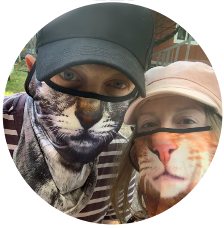 Lisa and Albert of the Purrfect Catch, with cat masks on